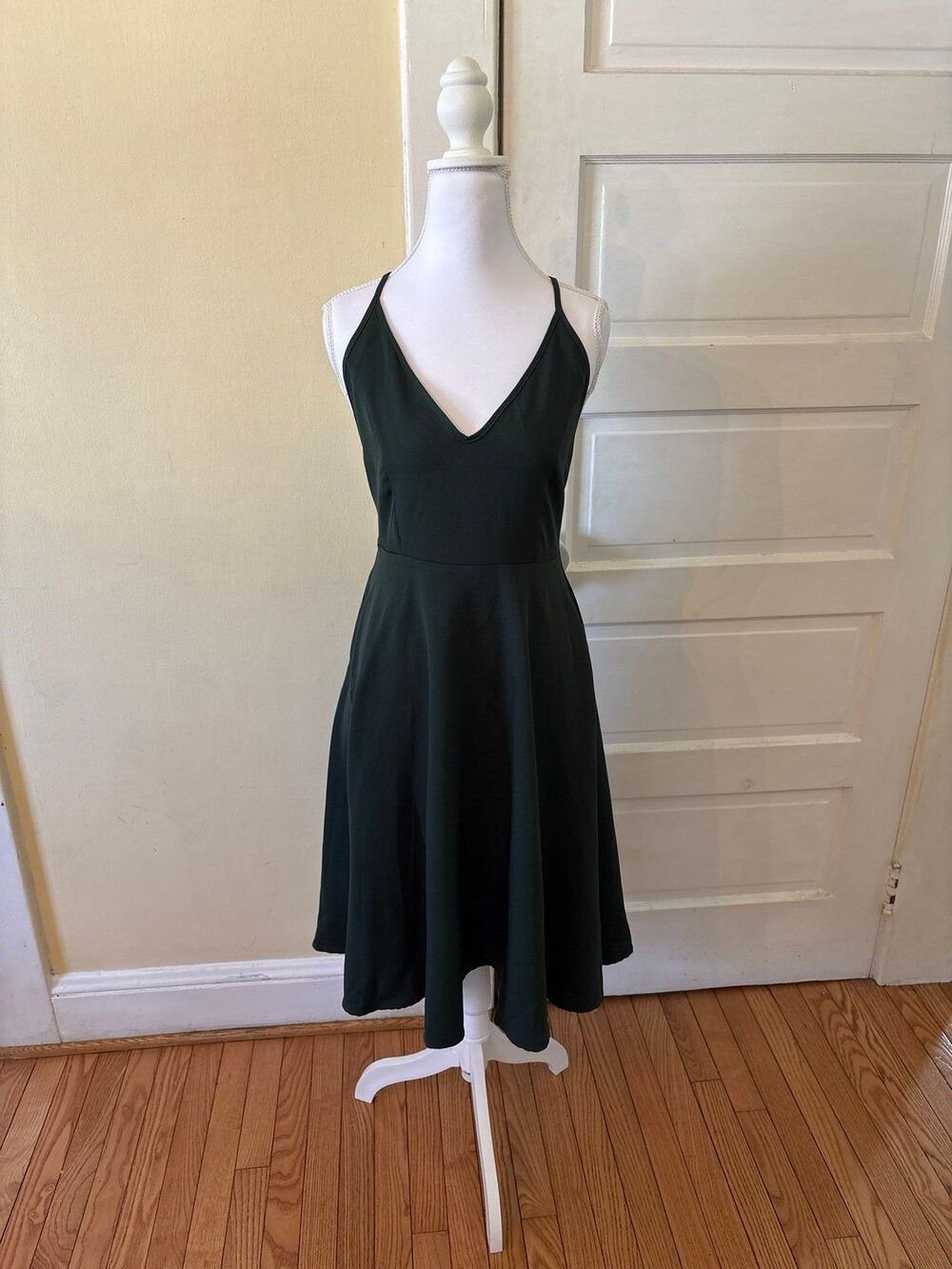 Green dress spaghetti strap V-neck pockets low back stretchy form fitting midi
